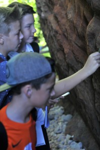 Pupils get a close encounter with this ancient rock formation